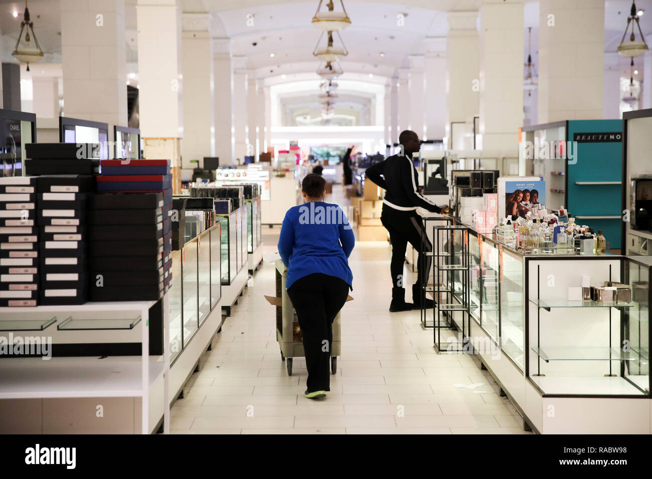 New York, USA. 3rd Jan, 2019. Staff members clear goods at Lord & Taylor flagship store on Fifth avenue in Manhattan, New York City, the United States, on Jan. 3, 2019. The famous department store chain Lord & Taylor officially closed its flagship store on Fifth avenue in Manhattan. The 11-storey building was a landmark on New York's most prestigious shopping area for over a century, boasting about its animated holiday windows and fine selection of jewelries and clothing and attracting city dwellers and tourists alike. Credit: Wang Ying/Xinhua/Alamy Live News Stock Photo