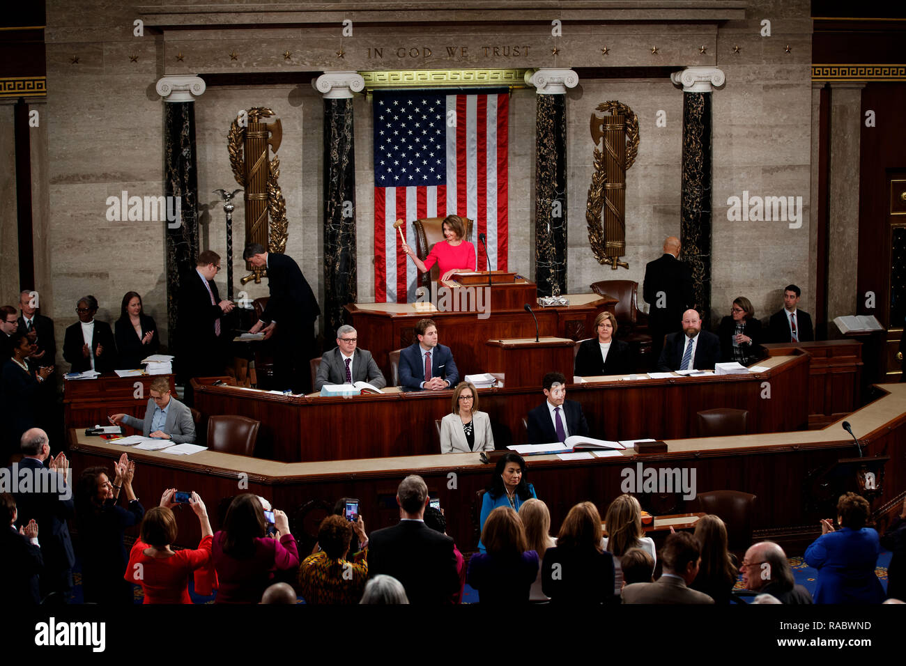 Washington, USA. 3rd Jan, 2019. Nancy Pelosi (C, Rear) holds the gavel after being elected the new speaker of the U.S. House of Representatives on Capitol Hill in Washington, DC, the United States, on Jan. 3, 2019. Representative Nancy Pelosi, a California Democrat, was elected the new speaker of the U.S. House of Representatives Thursday, the first day of a new, divided Congress. Credit: Ting Shen/Xinhua/Alamy Live News Stock Photo