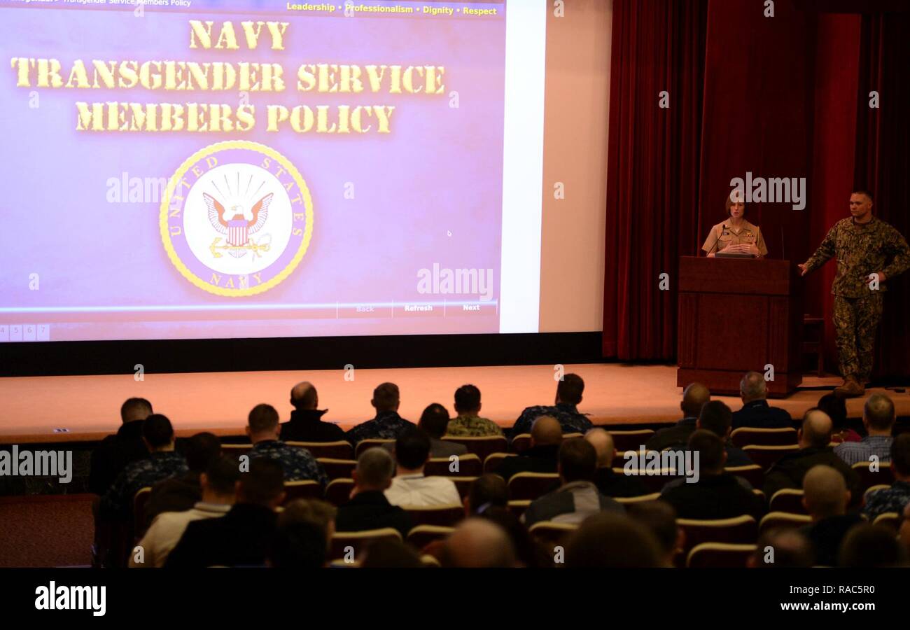NEWPORT, R.I. (Jan. 10, 2017) Capt. Tamara Graham, chief of staff at U.S. Naval War College (NWC), and Command Master Chief Craig Cole conduct mandatory Department of the Navy transgender policy training for Navy and Marine Corps military personnel at NWC in Newport, Rhode Island. On June 30, 2016, the Secretary of Defense announced that the Department of Defense had lifted the ban preventing transgender individuals from openly serving their nation in the military. In accordance with the new policy, all NWC military personnel are required to attend one of the four training sessions that will t Stock Photo