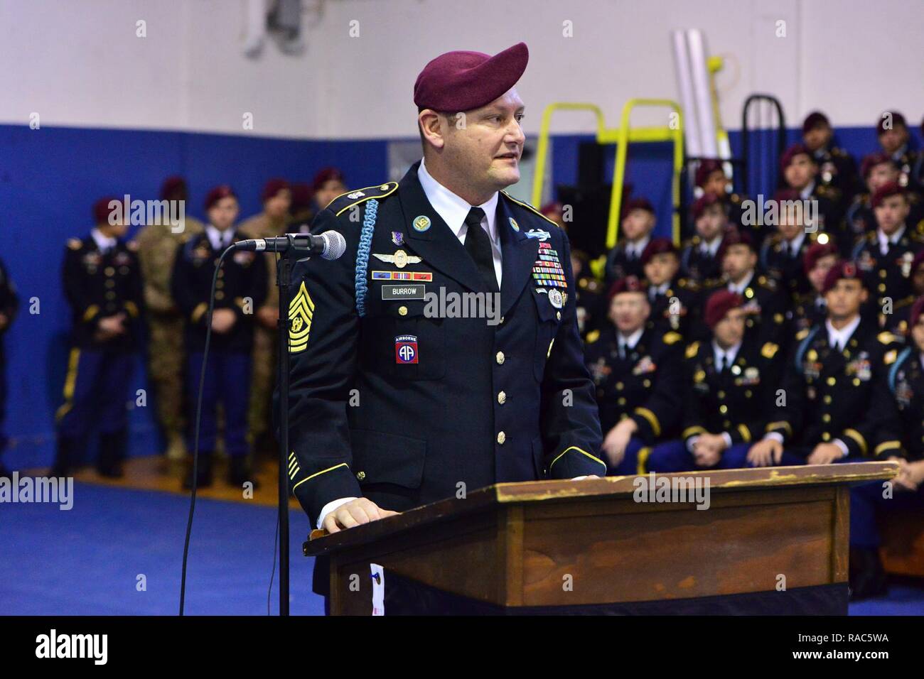 Outgoing Command Sgt. Maj. Charles L. Burrow, of 1st Battalion, 503rd Infantry Regiment, 173rd Airborne Brigade, gives a speech, January 12 2017, during a change of responsibility ceremony at Caserma Ederle, Vicenza, Italy, Jan. 12, 2017. The 173rd Airborne Brigade based in Vicenza, Italy, is the Army Contingency Response Force in Europe, and is capable of projecting forces to conduct the full of range of military operations across the United State European, Central and Africa Commands areas of responsibility. Stock Photo