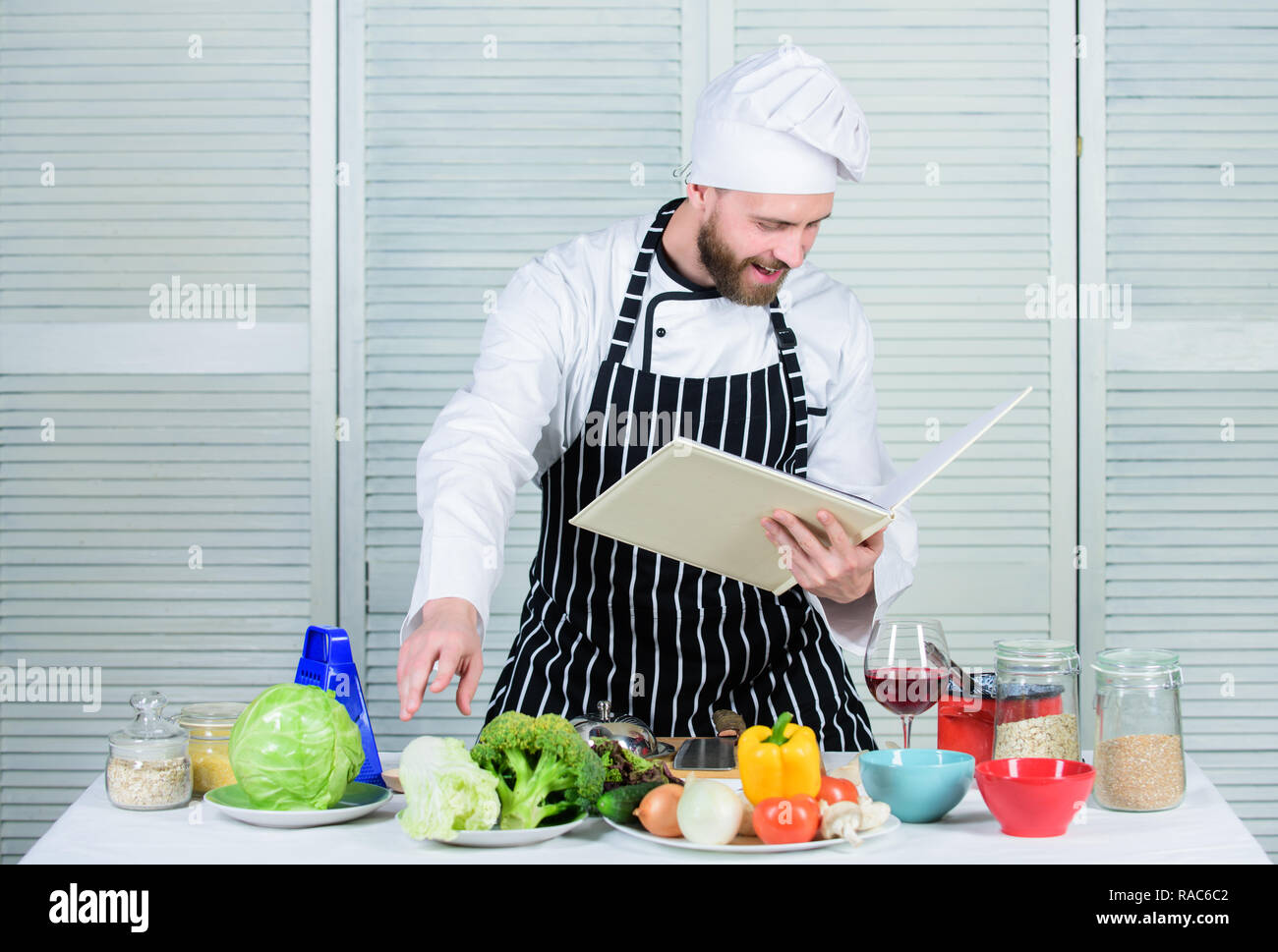 Man learn recipe. Improve cooking skill. Book family recipes. Ultimate