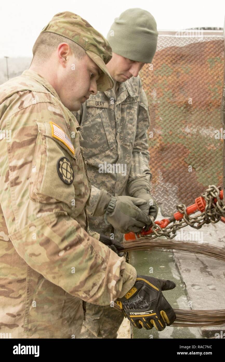 U.S. Army Spc. Larry Crumpton and Derek Gray, 220th Engineer Company