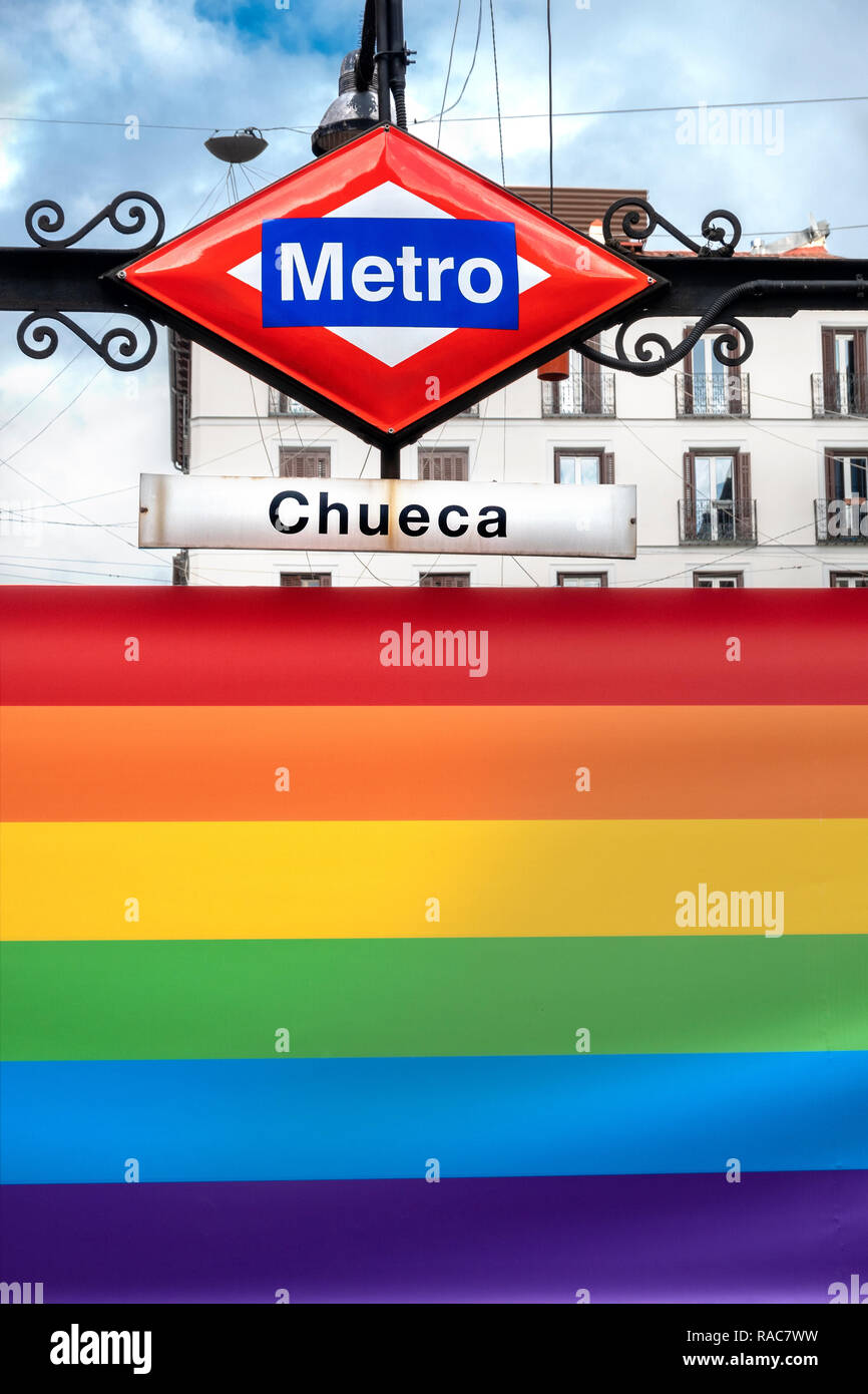 Madrid Chueca Metro station on Plaza de Chueca Madrid, Spain decorated with a rainbow flag in the heart of Madrid's LGBT gay district. Stock Photo