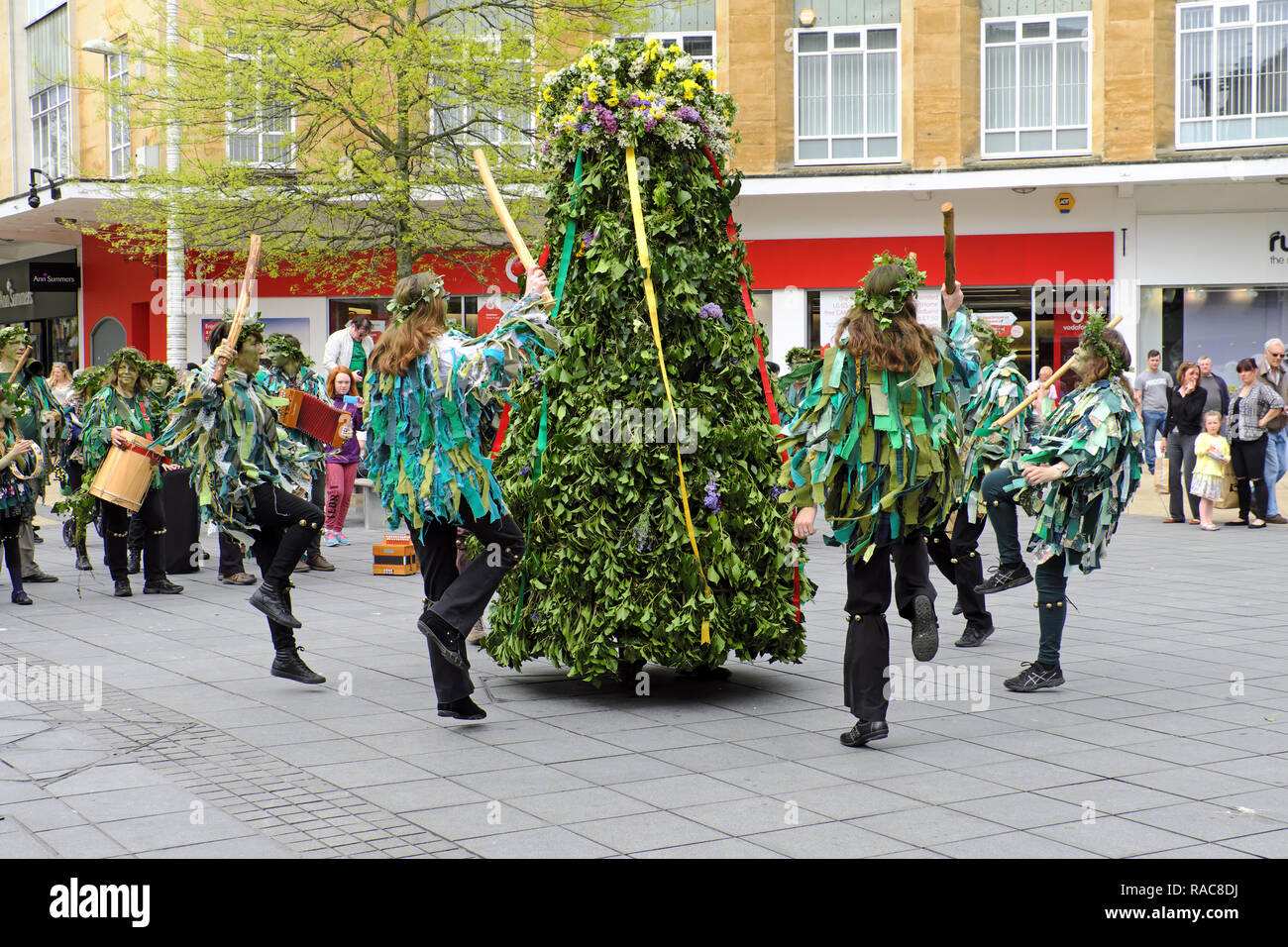 Jack in the Green and his attendants parade through the streets of Bristol, UK to celebrate May Day on 7 May 2016. Stock Photo