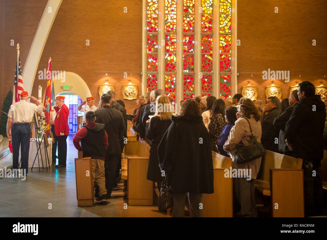 Friends, family, and Marines attend mass at the Simon and Jude Cathedral in Phoenix for the internment of 1969 Congressional Medal of Honor recipient U.S. Marine Corps Lance Cpl. Jose Francisco Jimenez on Jan. 17, 2017. Jimenez, originally a native of Mexico, moved with his family to Red Rock, Ariz. when he was 10 years old. Jimenez went on to the join the Marine Corps after graduating high school in 1968, before later being shipped to the Republic of Vietnam in February of 1969. In August of 1969, Jimenez was killed in action upon posthumously receiving the Medal of Honor for his courageous a Stock Photo