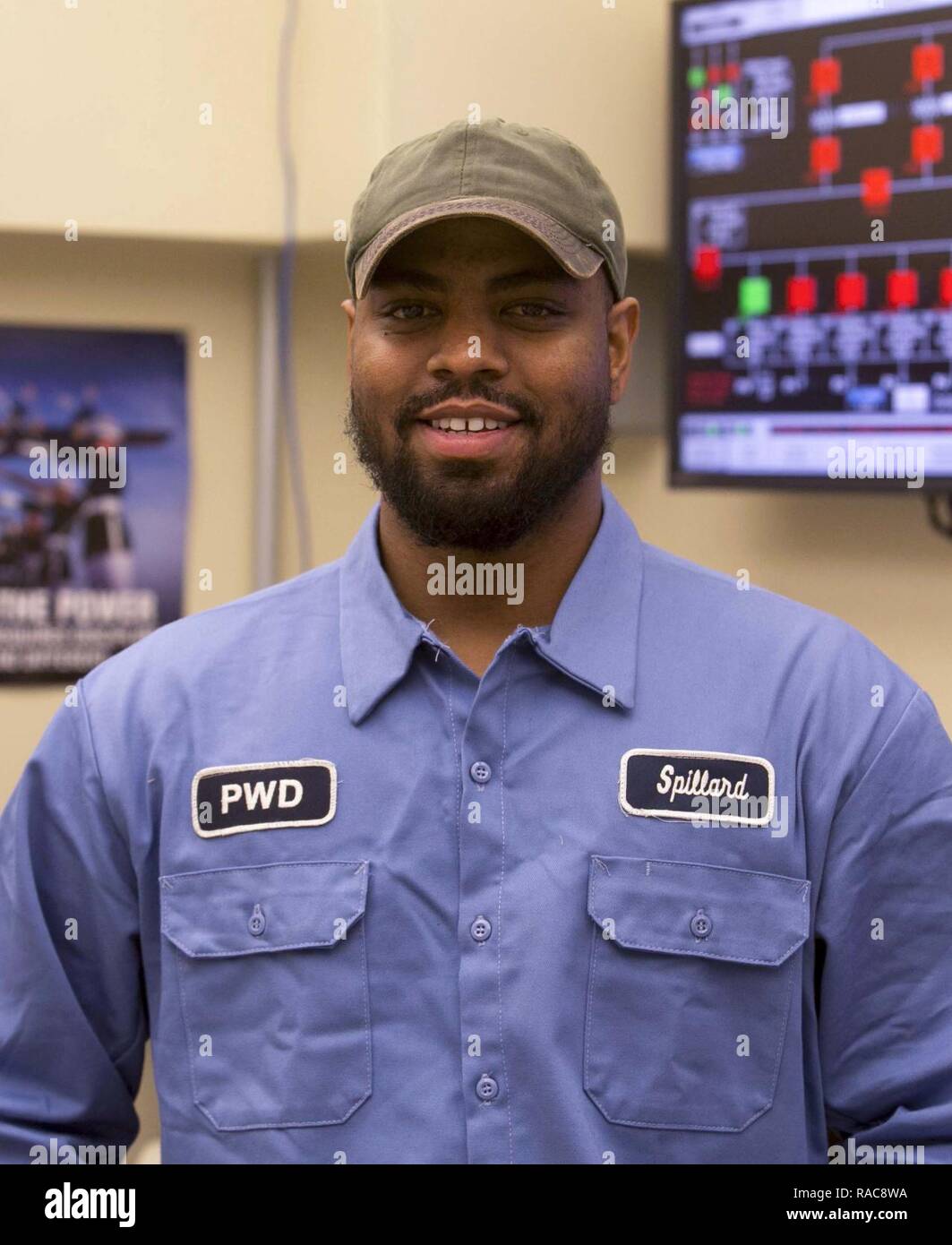 Mike Spillard, boiler plant operator, Public Works Division, enjoys  building and assembling components and has plans to study engineering in  Japan. Spillard, a former Marine intelligence specialist, is learning  Japanese while he