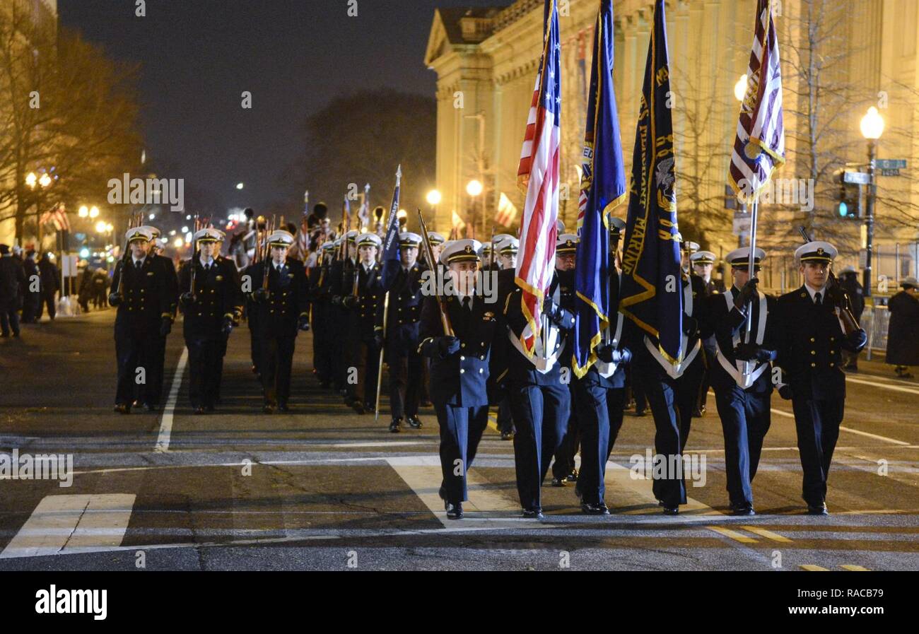 Cadets of the United States Merchant Marine Academy Color Guard march on Pennsylvania Avenue in Washington, D.C., Jan. 20, 2017, after the inauguration of Donald J. Trump as the 45th President of the United States of America. More than 5,000 military members from across all branches of the armed forces of the United States, including Reserve and National Guard components, provided ceremonial support and Defense Support of Civil Authorities during the inaugural period. Stock Photo
