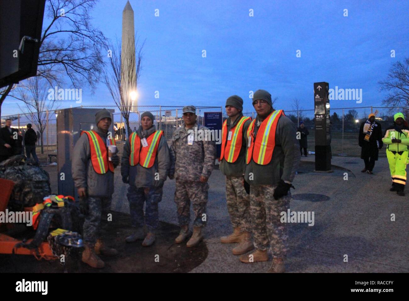 From left, Spc. Jose Gonzalez, Spc. Joan Padilla, Sgt. Julio Adorno, Spc. Mario Gerena, and Sgt. Carlos Lopez of Puerto Rico's 770th Military Police, based in Aguadilla, prepare to guide traffic and crowds at the 58th Presidential Inauguration, in Washington D.C., Jan. 20, 2017. The soldiers assisted at a traffic control point near Constitution Avenue and 17th Street in Washington, D.C. More than 7,500 Guard soldiers and airmen provided support for the event. (National Guard Stock Photo