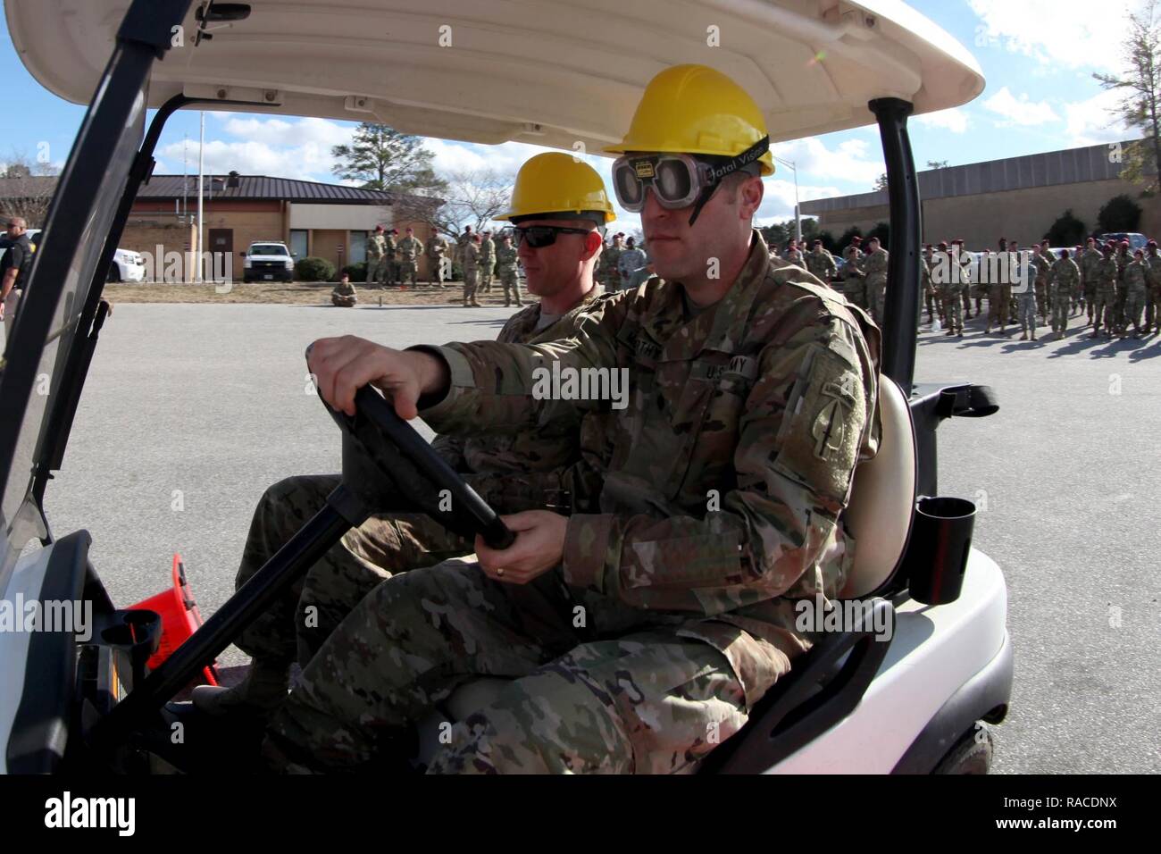 Lt. Col. Patrick McCarthy, Commander of 7th Military Information Support Battalion, 4th Military Information Support Group, attempted to navigate a simple cone driving course while wearing vision distorting “drunk goggles” meant to simulate a blood alcohol content between .08 and .15, Jan. 12, 2017. The Fort Bragg Provost Marshall Office Traffic Division assisted 7th Military Information Support Battalion, to conduct an alcohol awareness safety class to raise awareness of alcohol’s rapid effects and to deter drunken driving. Stock Photo