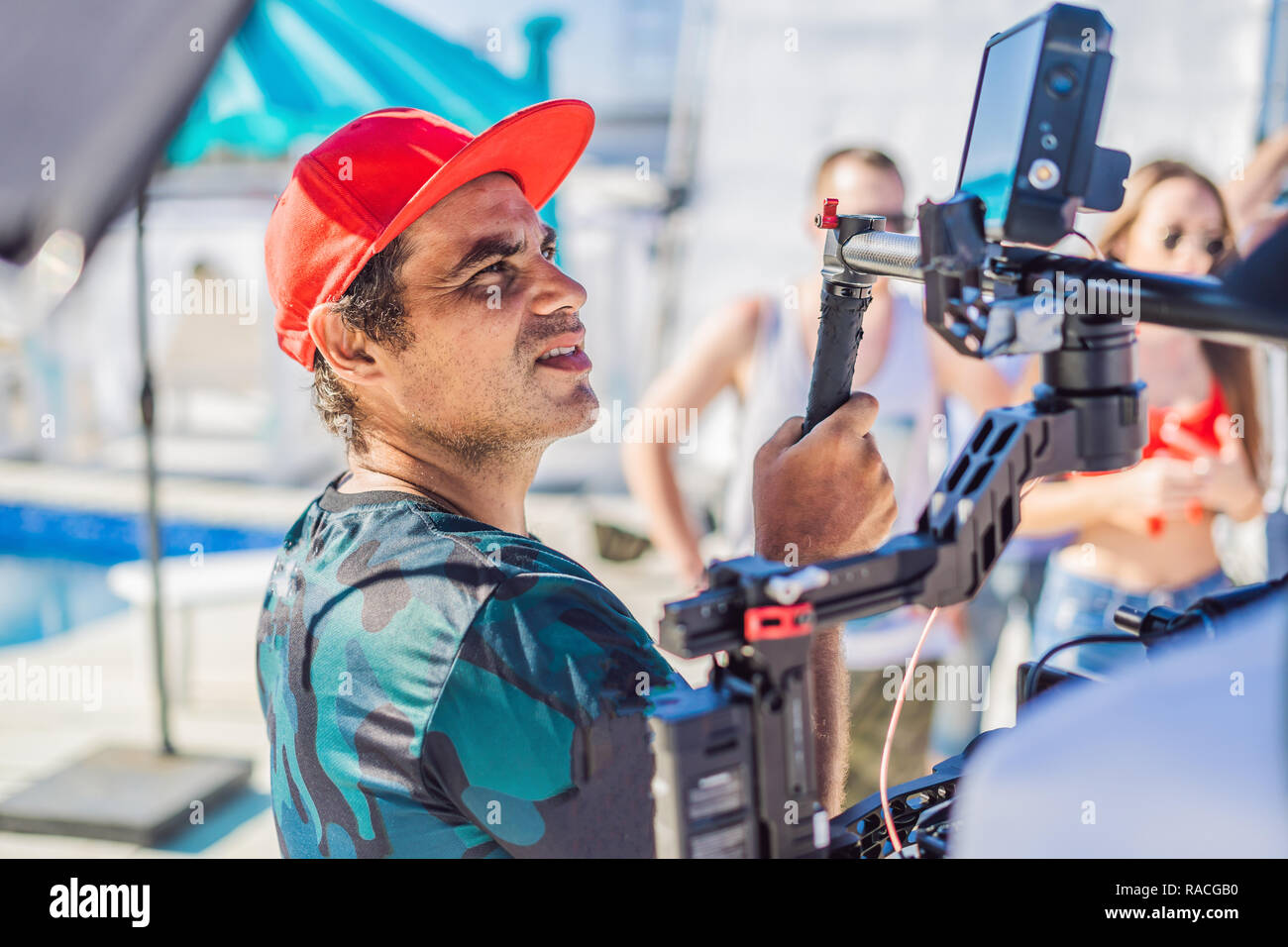 Professional steadicam operator uses a 3axis camera stabilizer system