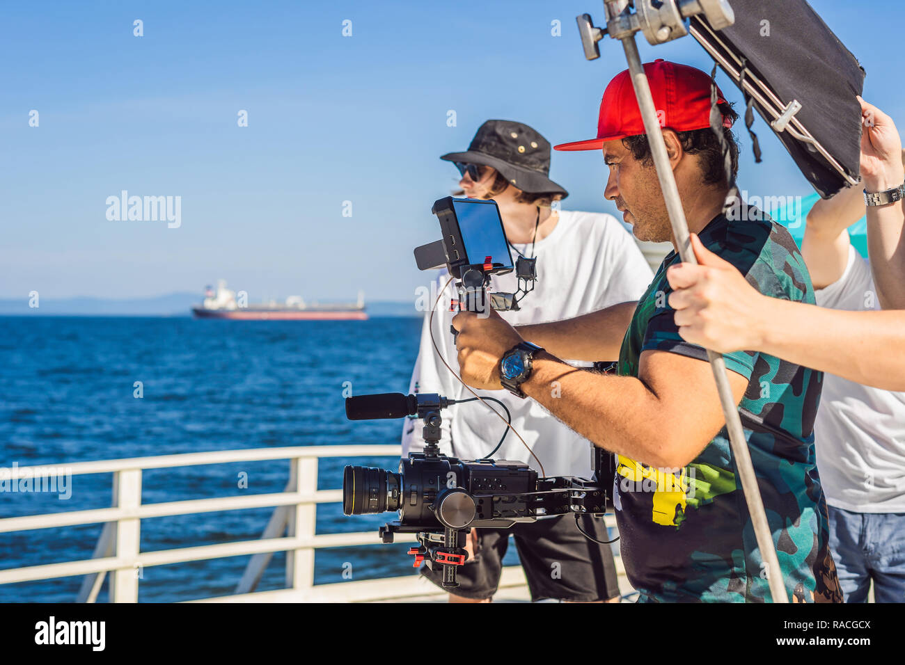 Professional steadicam operator uses a 3axis camera stabilizer system