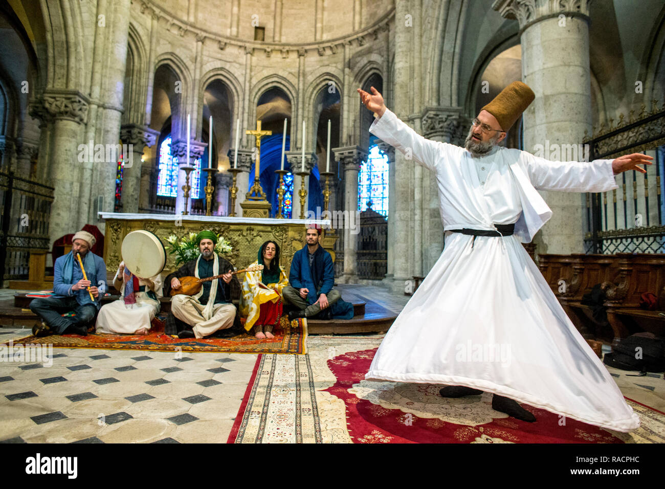 Sufi music band and Whirling Dervish at Sufi Muslim wedding in St. Nicolas's Catholic church, Blois, Loir-et-Cher, France, Europe Stock Photo