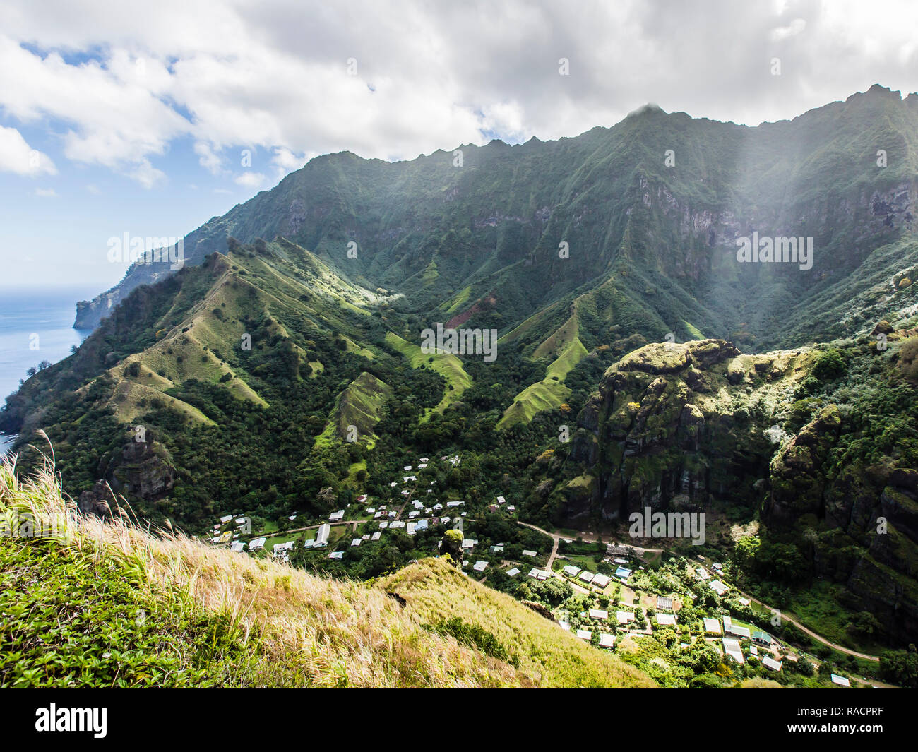 Tropical forest surrounding the town of Hanavave, Fatu Hiva, Marquesas, French Polynesia, South Pacific, Pacific Stock Photo