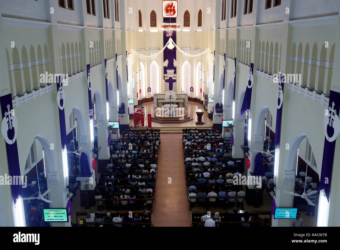 Catholic Mass on Good Friday of Holy Week, Gia Dinh Church, Ho Chi Minh City (Saigon), Vietnam, Indochina, Southeast Asia, Asia Stock Photo