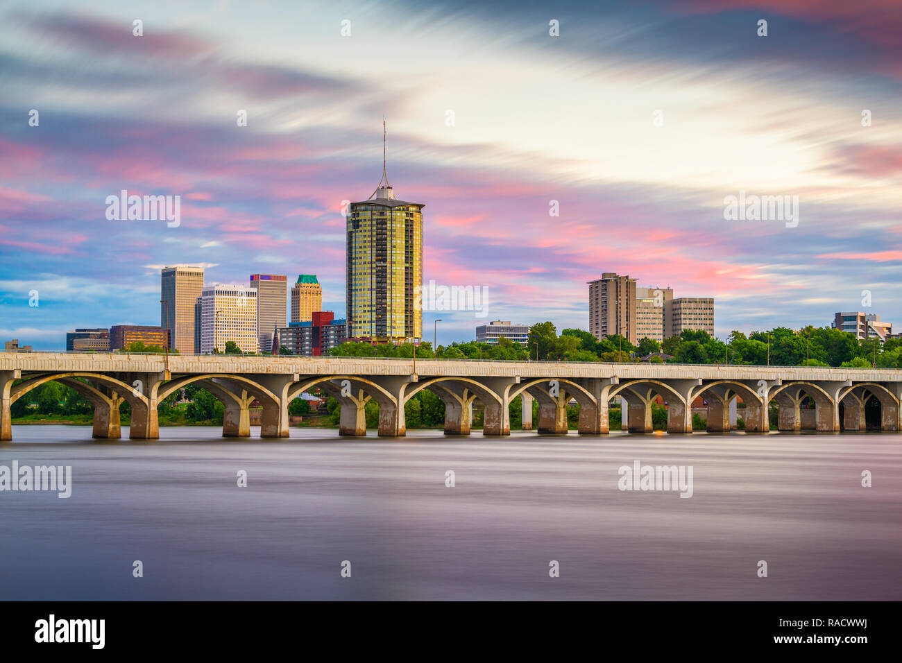 Tulsa, Oklahoma, USA downtown skyline on the Arkansas River at dusk