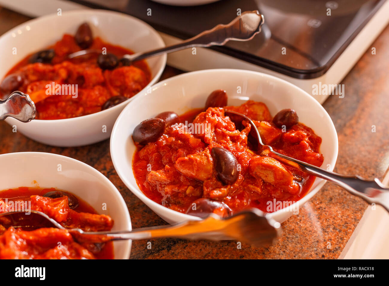 Homemade rabbit stew with vegetables and olive beans Stock Photo