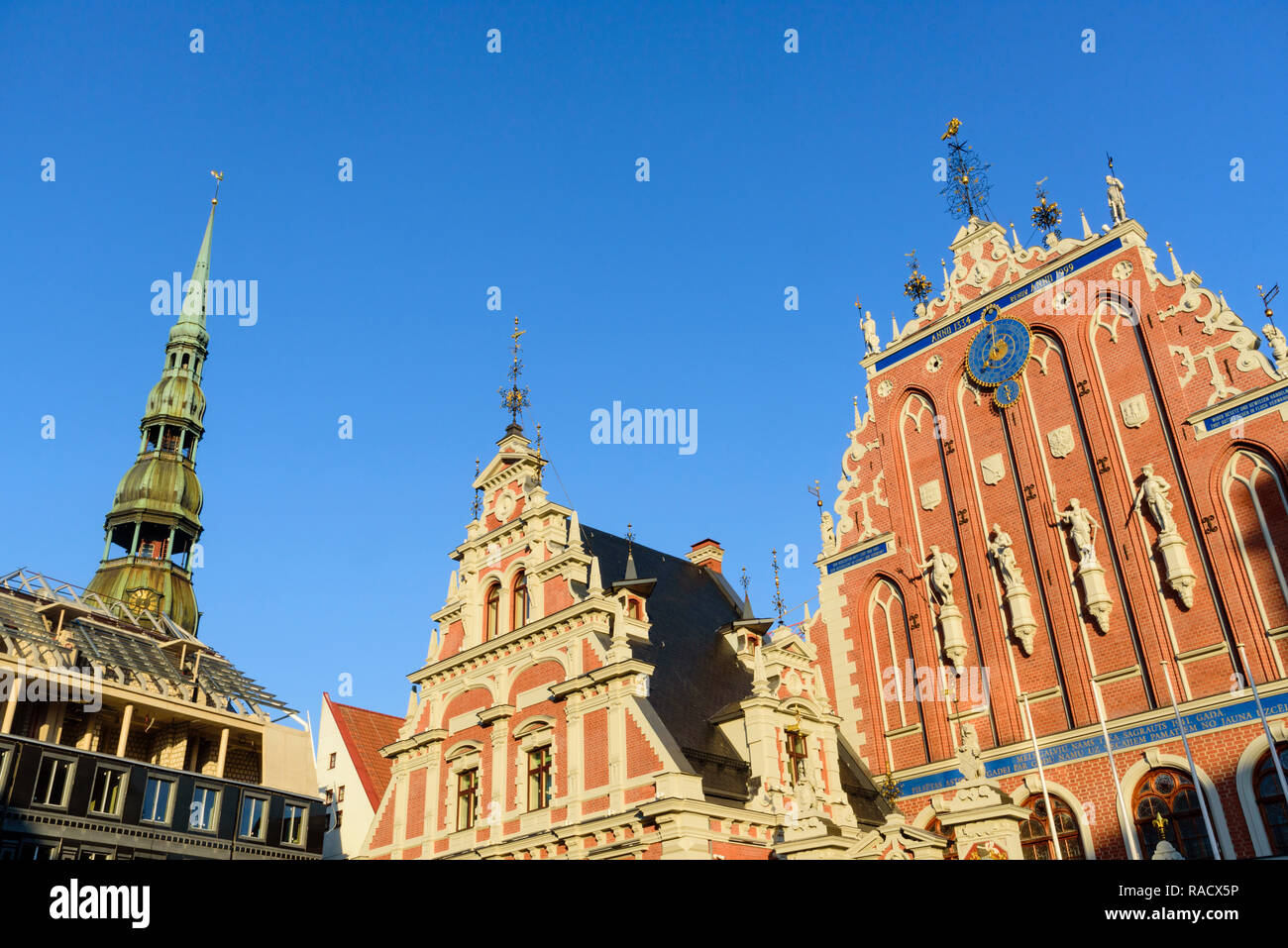 St. Peter's Church's spire, House of Blackheads, Town Hall Square, UNESCO World Heritage Site, Riga, Latvia, Europe Stock Photo