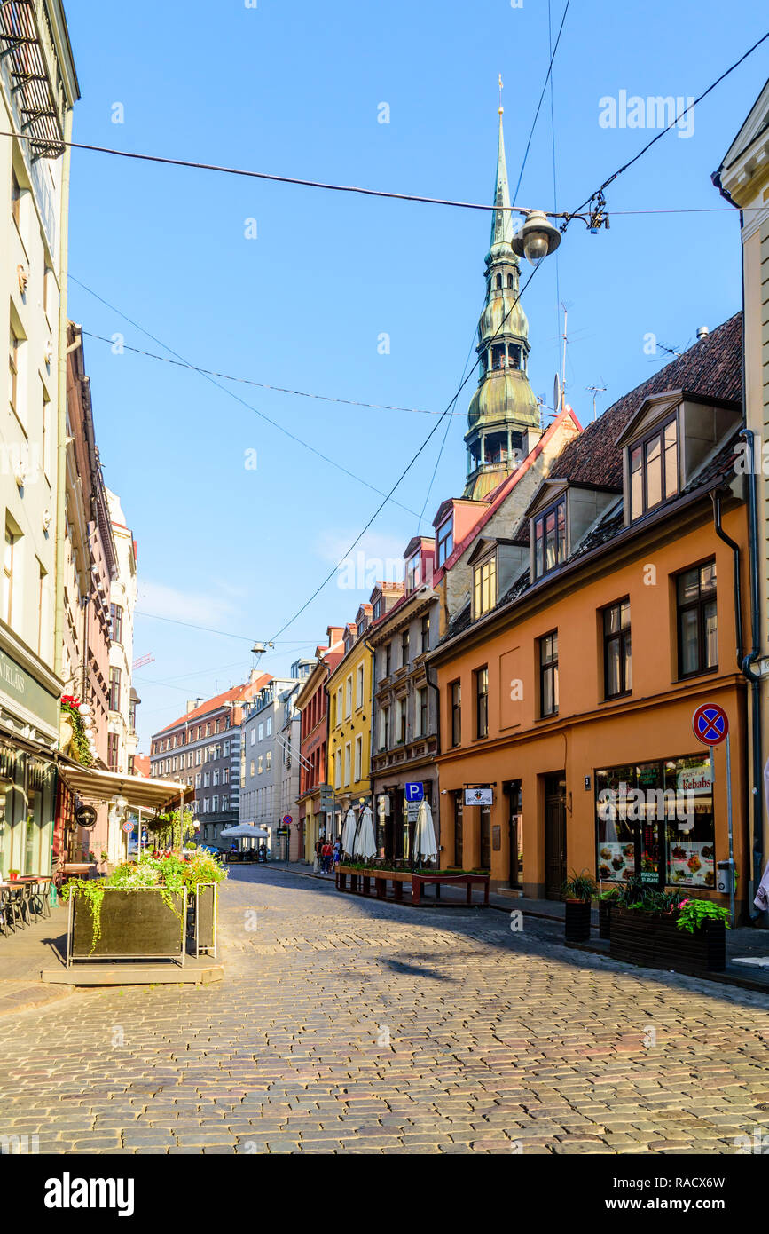 Grecinieku Street with St. Peter's Church in background, Old Town, UNESCO World Heritage Site, Riga, Latvia, Europe Stock Photo