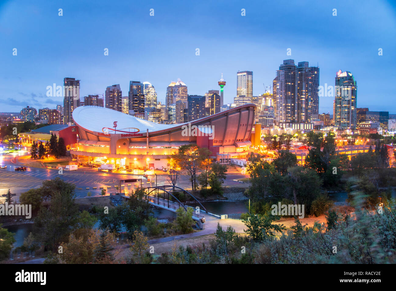 View of the Saddledome and Downtown skyline from Scottsman Hill at dusk, Calgary, Alberta, Canada, North America Stock Photo