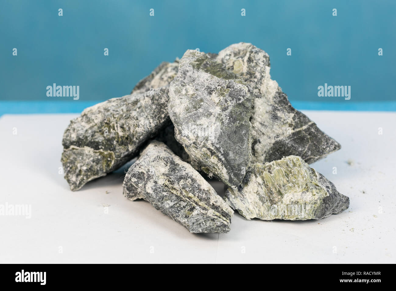 Mineral asbestos in the composition of the stone enclosing rock Stock