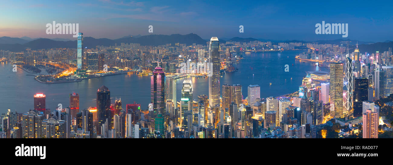 Skyline of Hong Kong Island and Kowloon from Victoria Peak at dusk, Hong Kong Island, Hong Kong, China, Asia Stock Photo