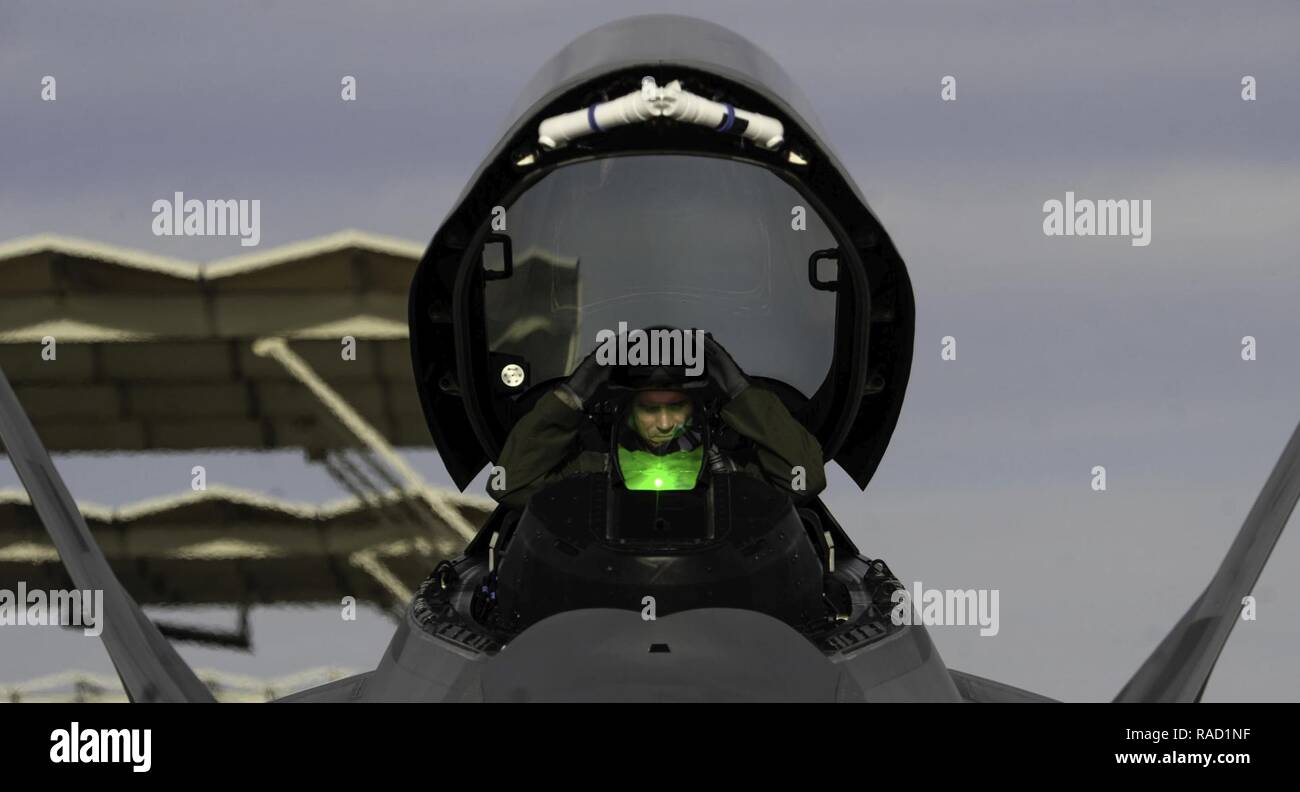 An F-22 Raptor pilot assigned to the 1st Fighter Wing, Joint Base ...