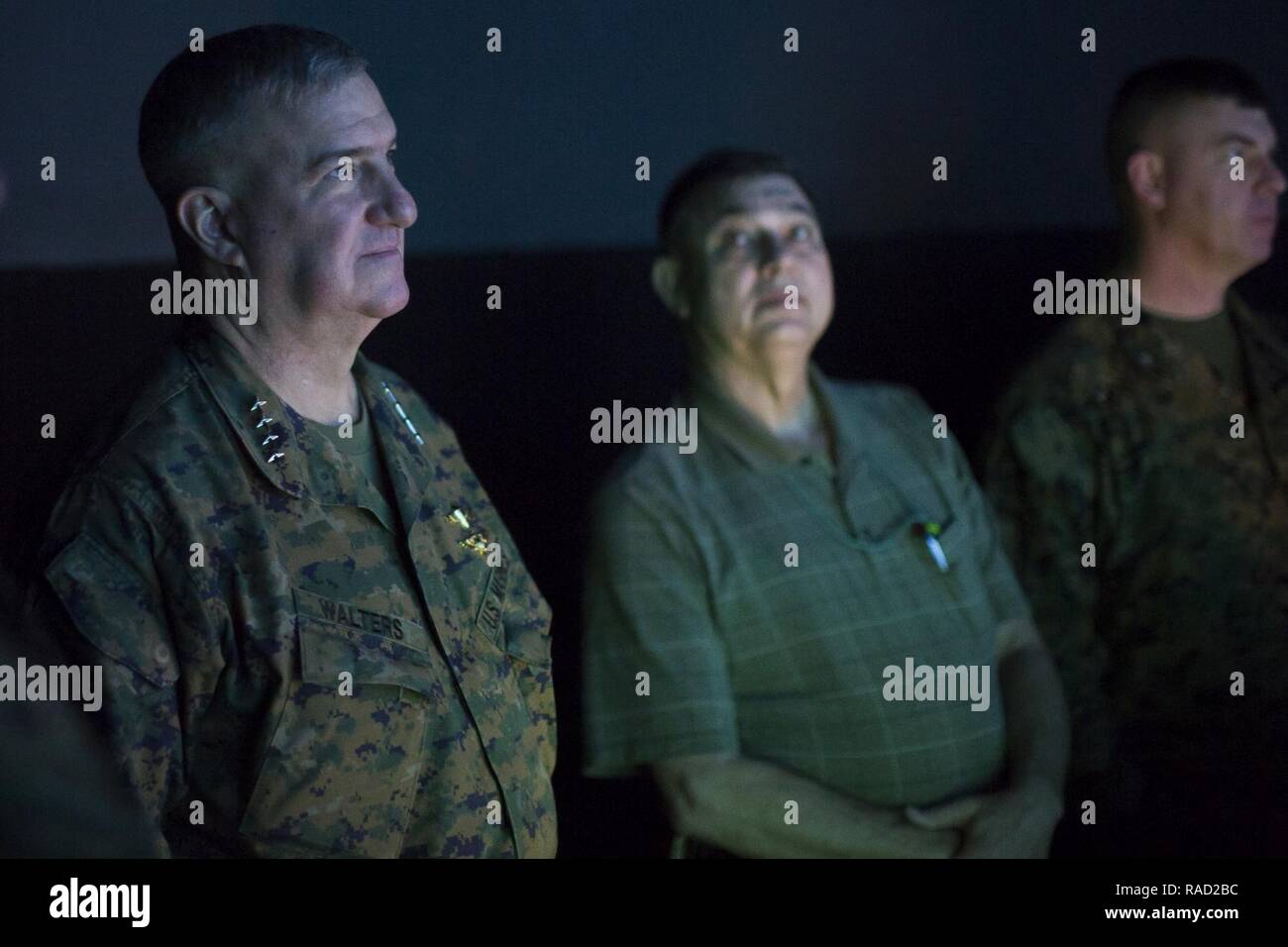 U.S. Marine Corps Gen. Glenn Walters, Assistant Commandant of the Marine Corps, observes a simulator training system during a visit to Camp Lejeune, N.C., Jan. 26, 2017. The purpose of the visit was to increase awareness and capabilities of ground simulation and simulator training systems in support of operational forces combat readiness. Stock Photo