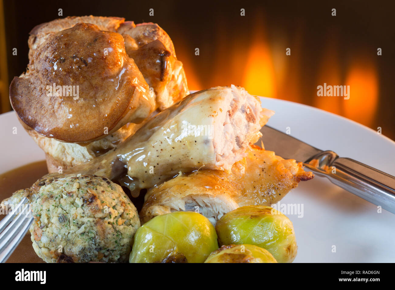 A popular British roast Chicken Sunday dinner with Yorkshire pudding
