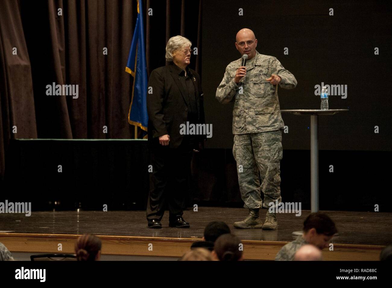 U.S. Air Force Chief Master Sgt. Alexander Del Valle, 51st Fighter Wing command chief, thanks Dave Roever, a Vietnam War veteran, for speaking about resiliency at Osan Air Base, Republic of Korea, Jan. 25, 2017. Roever, is an inspirational speaker who shares his story about how he survived after suffering burns all over his body when a phosphorus grenade exploded in his hand during the war. Stock Photo