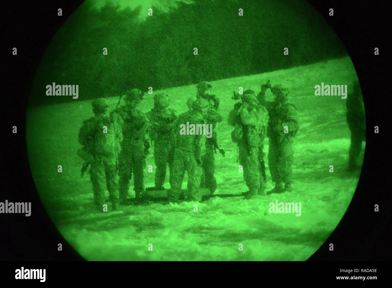 U.S. Army paratroopers from the 173rd Brigade Support Battalion, 173rd Airborne Brigade, conduct night casualty evacuation training with Slovenian Air Force Eurocopter H3-72 during exercise Lipizzaner III in Pocek, Slovenia, Jan. 28, 2017. Lipizzaner is a combined squad-level training exercise in preparation for platoon evaluation, and to validate battalion-level deployment procedures. Stock Photo