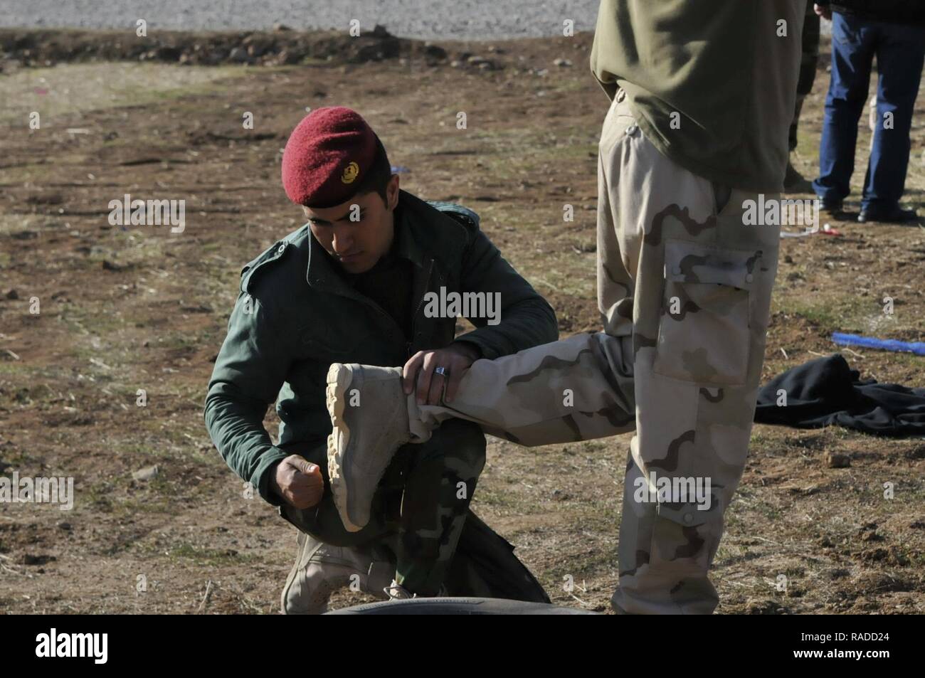Iraqentry Control Point A Peshmerga soldier conducts a search on a Dutch soldier during entry ...