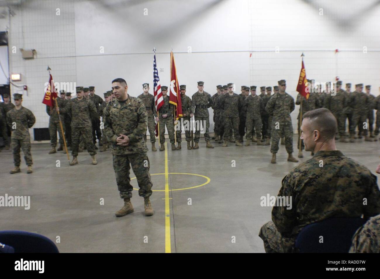 LtCol Johnny Gutierrez, incoming Commanding Officer of 4th Law Enforcement Battalion, addresses attendees at the Battalion’s change of command ceremony, held on January 21, 2017 at 4th Law Enforcement Battalion’s headquarters in St. Paul, Minnesota.  During that change of command, LtCol Gutierrez assumed command of 4th LEB from outgoing commander Col Michael Bracewell (seated right, foreground).    4th Law Enforcement Battalion (4th LEB), a subordinate unit of FHG, is a reserve Marine Corps military police battalion.  Headquartered in St. Paul, the Battalion’s subordinate units are located in  Stock Photo