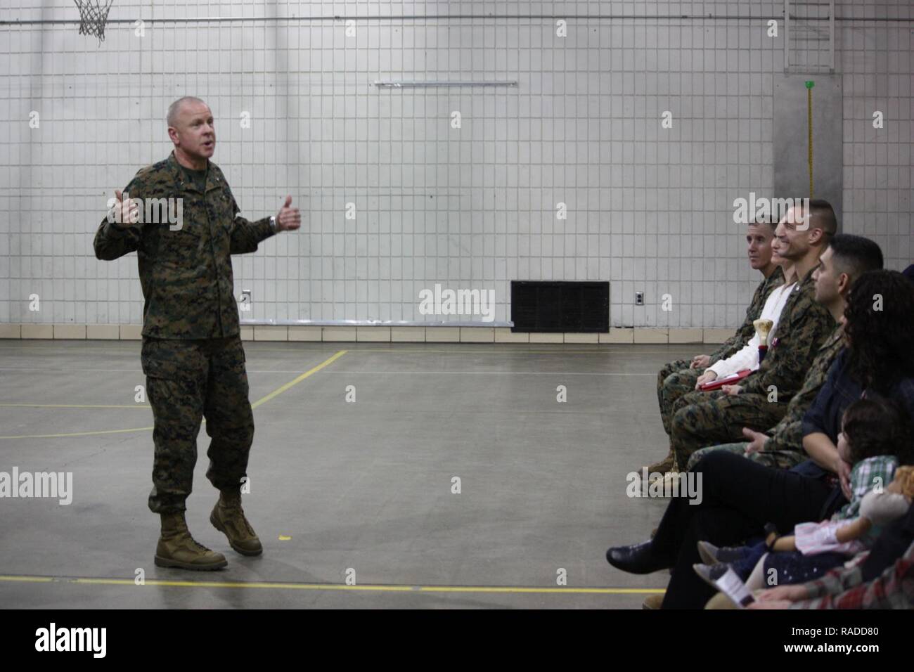 Brigadier General Michael F. Fahey, Commanding Officer of Force Headquarters Group (FHG), addresses attendees during 4th Law Enforcement Battalion’s change of command ceremony on January 21, 2017, at the Battalion’s headquarters in St. Paul, Minnesota.  During that change of command ceremony, Col Michael Bracewell (seated, third from left) relinquished command of 4th LEB to incoming commanding officer LtCol Johnny Gutierrez (seated, fourth from left).    4th Law Enforcement Battalion (4th LEB), a subordinate unit of FHG, is a reserve Marine Corps military police battalion.  Headquartered in St Stock Photo