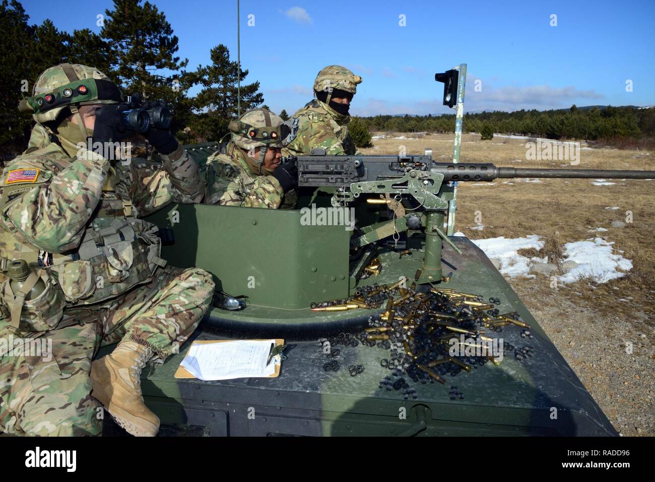 U.S. Army paratroopers from the 173rd Brigade Support Battalion, 173rd Airborne Brigade qualify with the .50-caliber machine gun during Exercise Lipizzaner III in Bac, Slovenia, on Jan. 25, 2017. Lipizzaner is a combined squad-level training exercise in preparation for platoon evaluation, and to validate battalion-level deployment procedures. Stock Photo