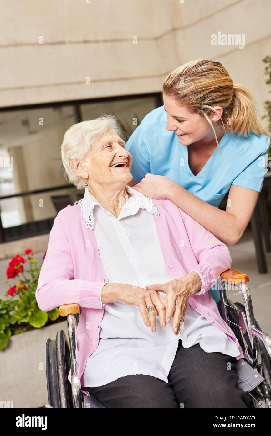 Happy wheelchair people hi-res stock photography and images - Alamy