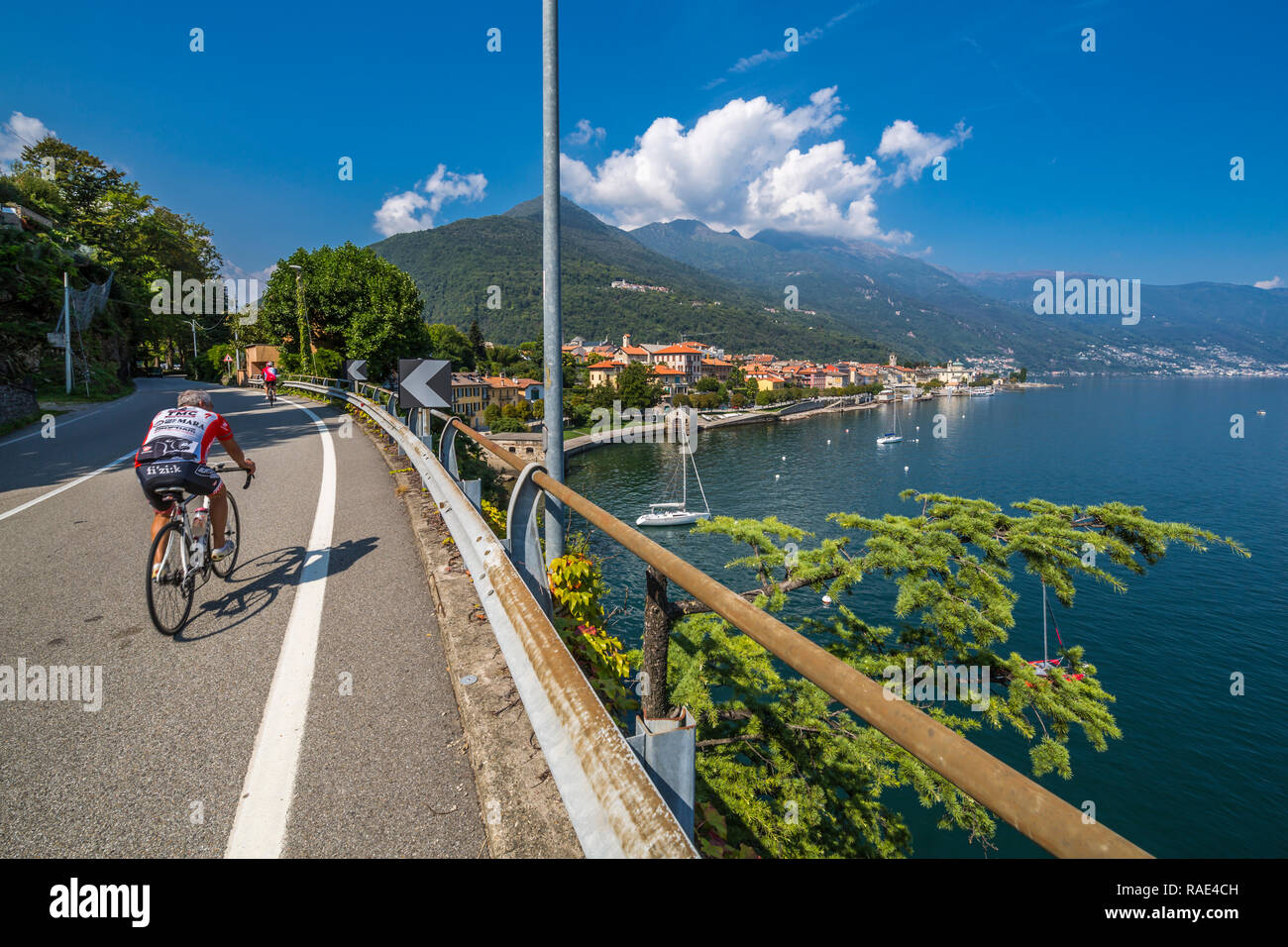 Cyclists on road leading to Cannobio and Lake Maggiore, Lake Maggiore, Piedmont, Italian Lakes, Italy, Europe Stock Photo