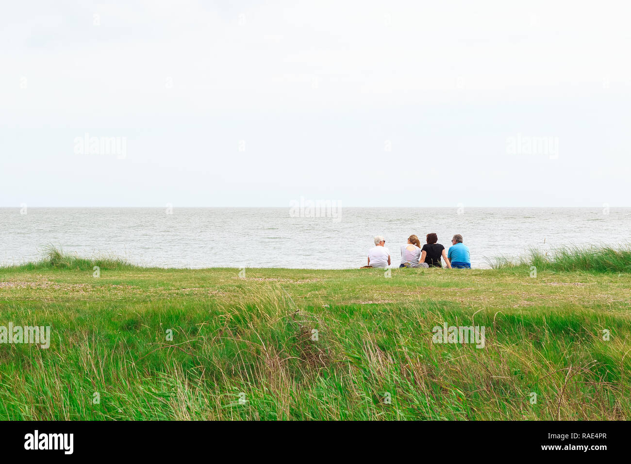 Family at beach back view uk hi-res stock photography and images - Alamy
