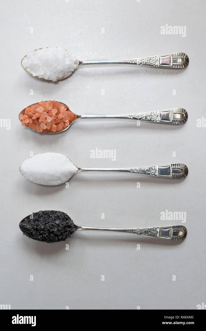 Four different types of salt. From the top sea salt flakes, Himalayan