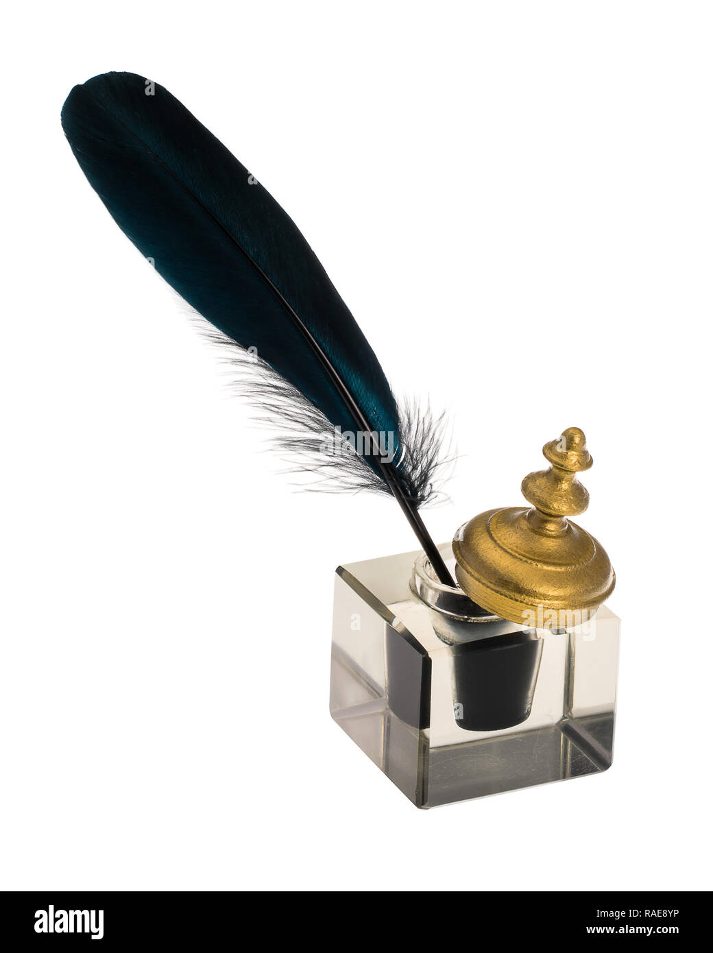 Antique inkpot with gold cap and black feather isolated on white background Stock Photo