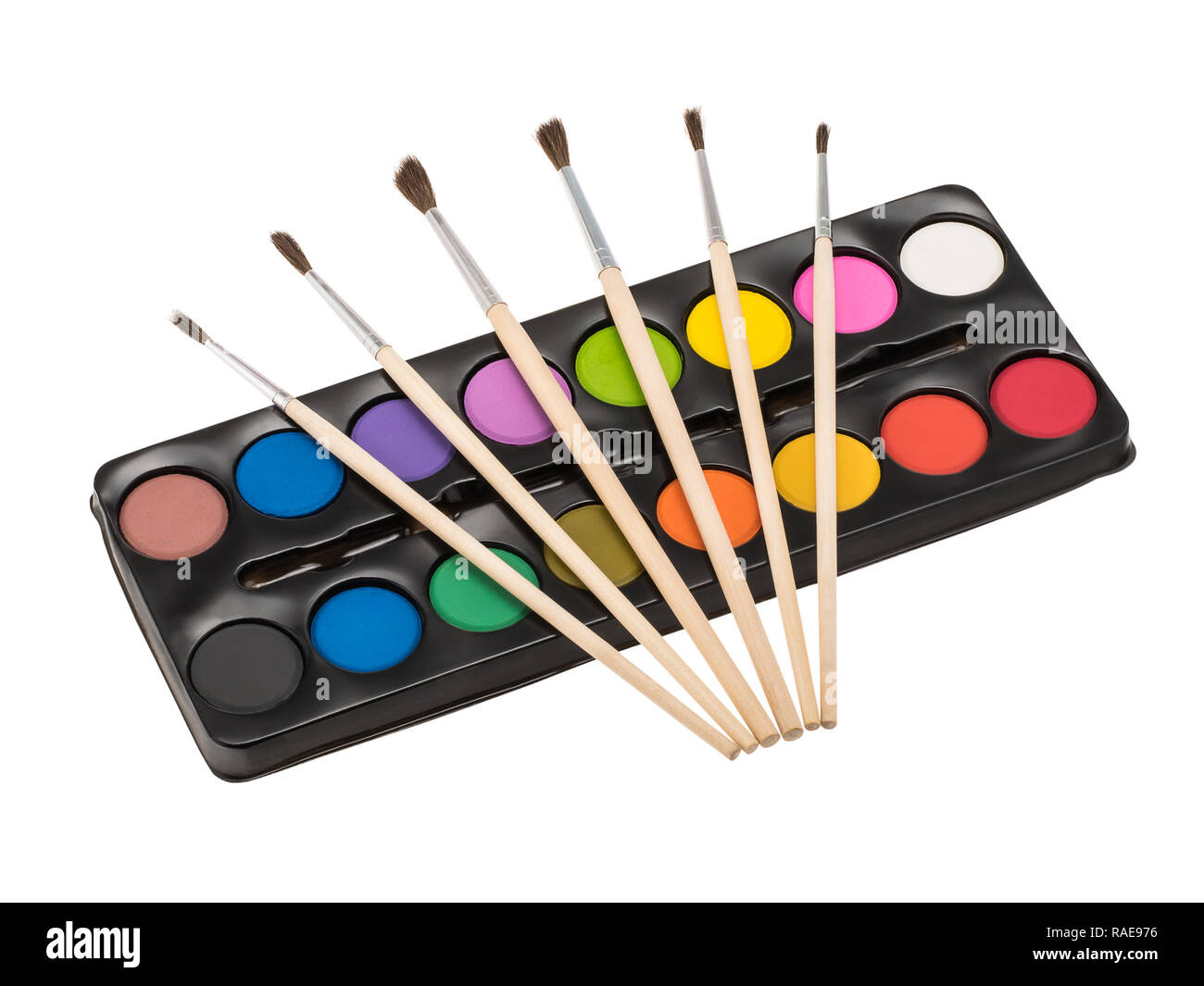 Box of watercolors and fanned out paintbrushes Stock Photo