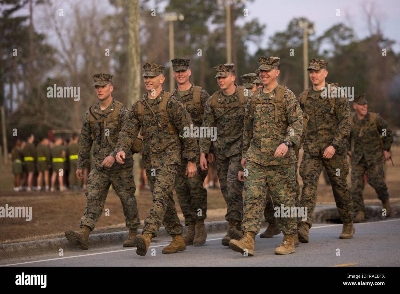 U.S. Marines with 2nd Marine Division (2d MARDIV), participate in the 2d MARDIV 50-mile challenge hike on Camp Lejeune, N.C., Feb. 1, 2017. The hike was held to challenge Marines of 2d MARDIV as well as test their skill and will. Stock Photo