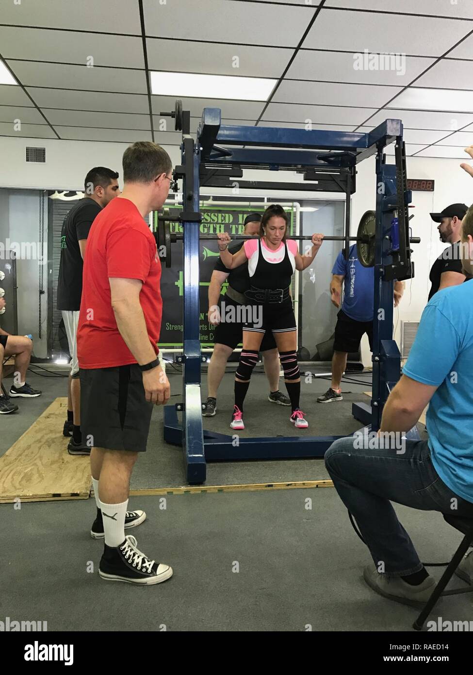 U.S. Army Sergeant First Class (SFC) Jennifer Palacios performs a squat during in the American Powerlifting Association (APA) Thunder Bay Throwdown. Palacios broke the Florida state squat record in the Raw Sub Master (33-39) age division by lifting 230lbs. Stock Photo