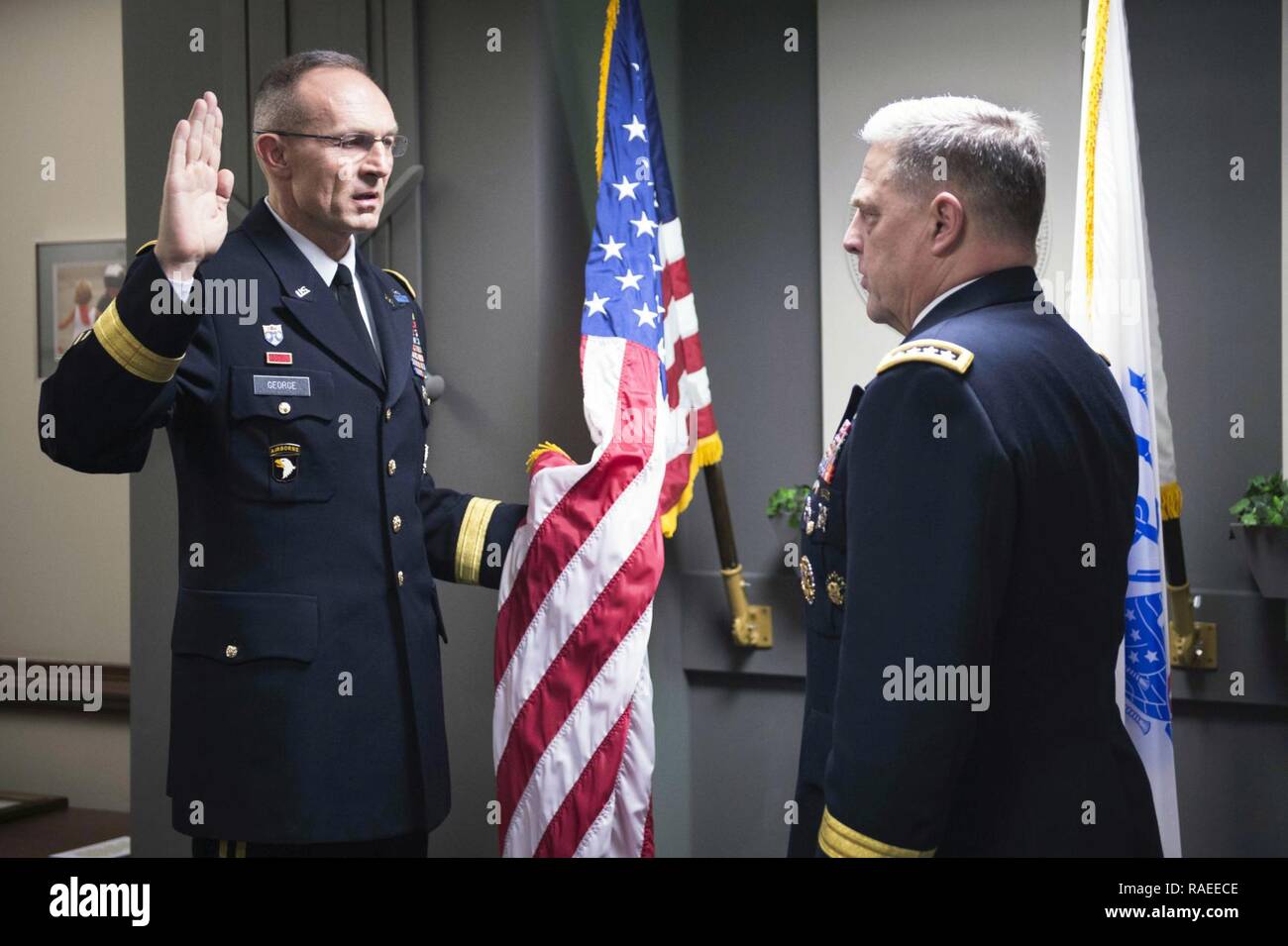U.S. Army Chief of Staff, Gen. Mark A. Milley, right, administers a ...