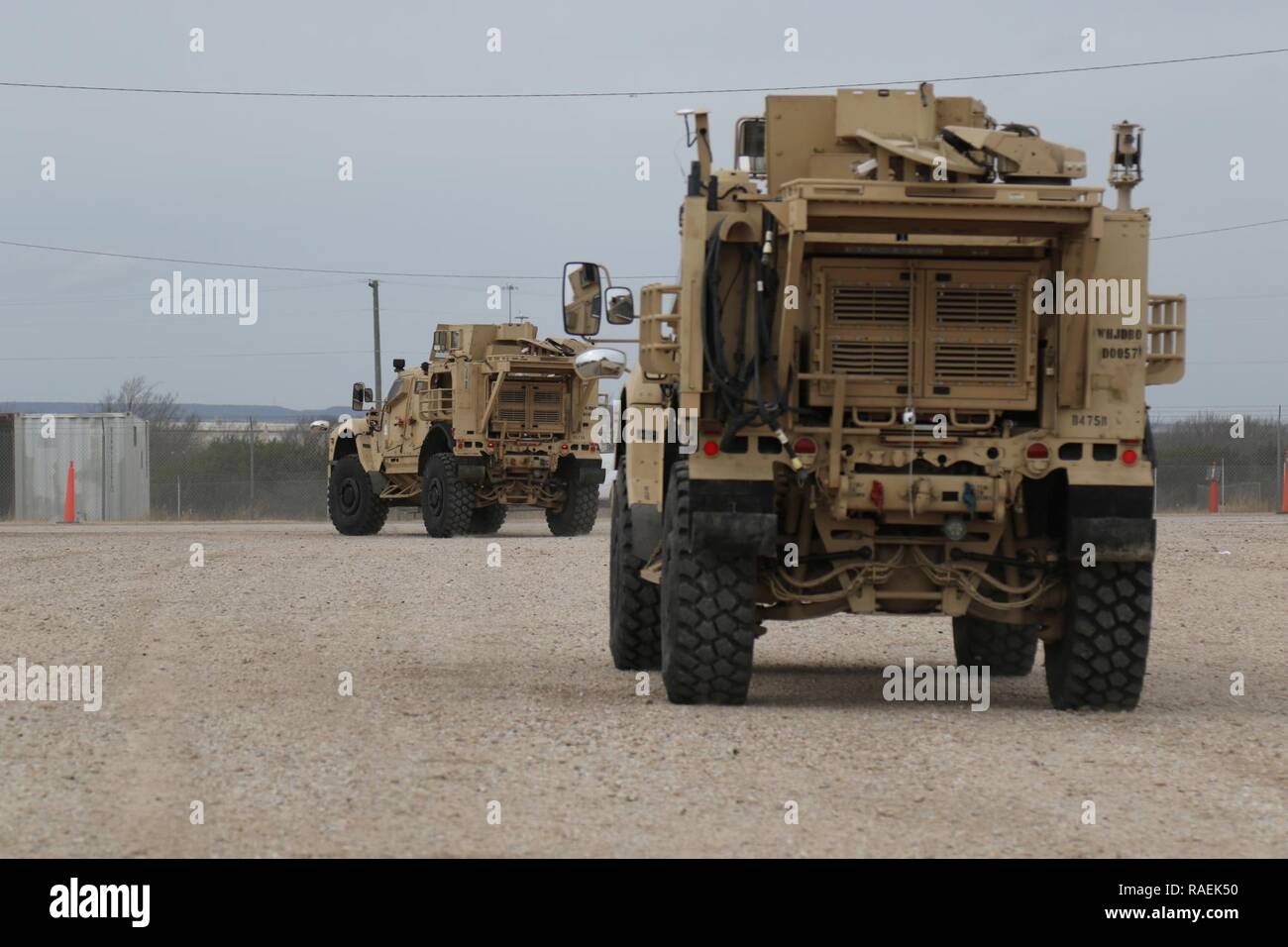 Soldiers with the 504th Military Intelligence Brigade drive Mine Resistant Ambush Protected Vehicles, Dec. 12, 2018, Fort Hood Texas. They were prepping the vehicles to be loaded onto the rail. Stock Photo