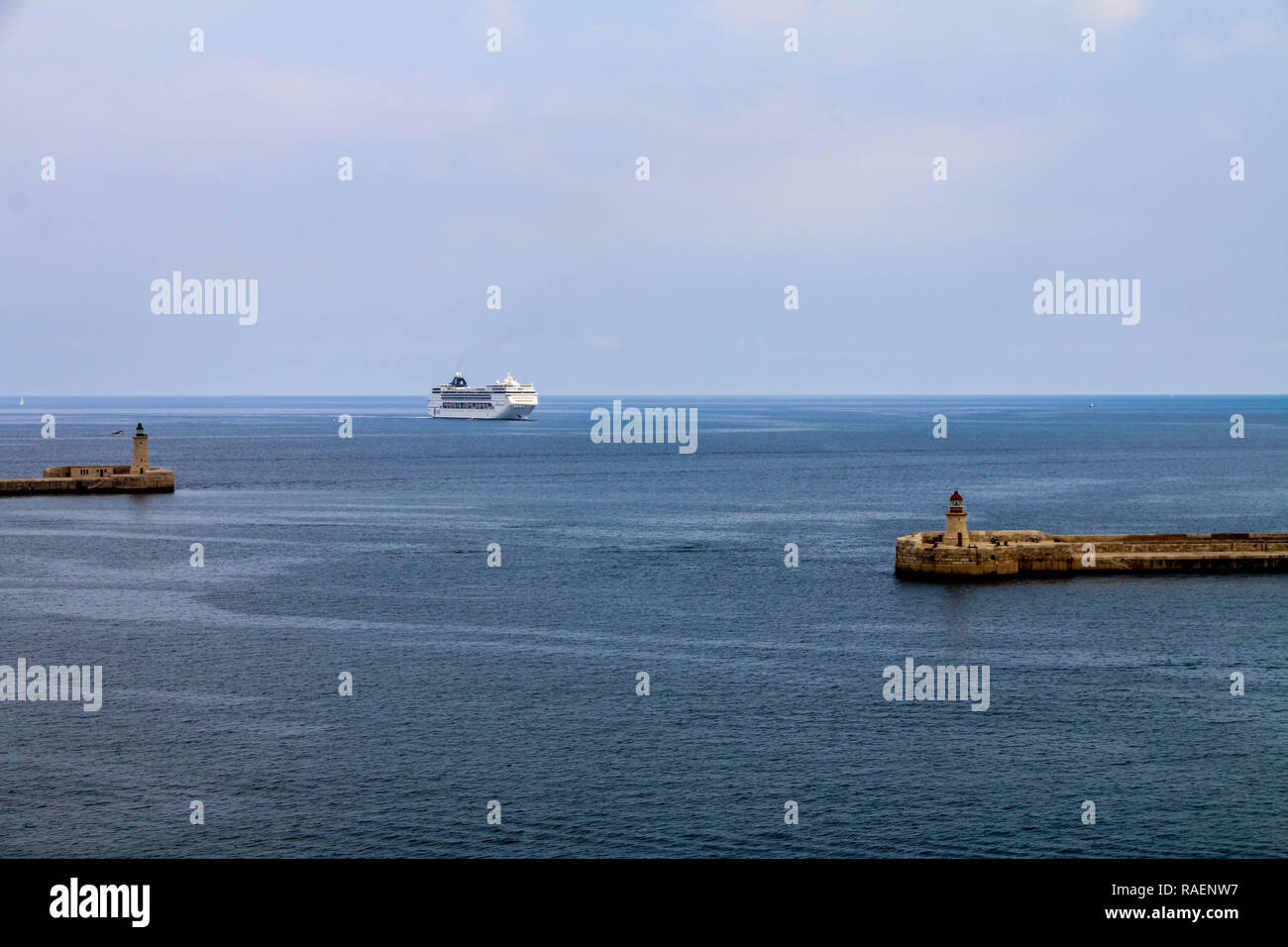 MSC Opera cruiser ship entering to the Valletta's harbor at Valletta, Malta. Stock Photo