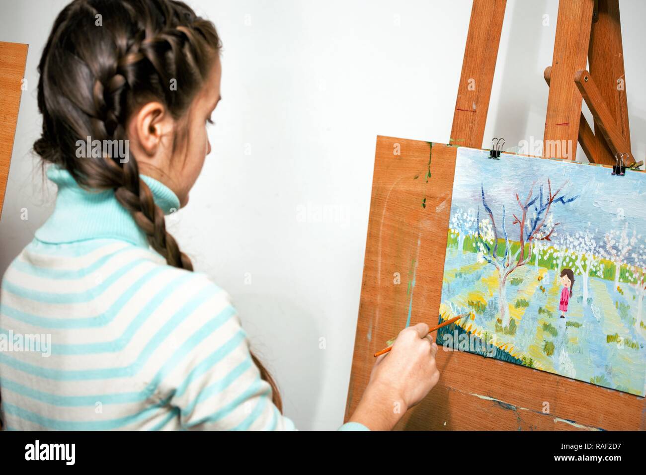 girl artist writes oil painting Stock Photo - Alamy