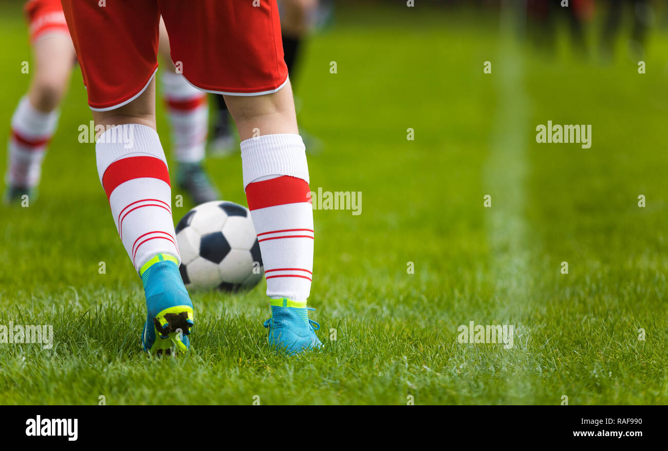 Detail Soccer Background Close Up Legs And Feet Of Football Player In White Socks And Blue Cleats Playing Game On Green Grass Pitch Footballers In R Stock Photo Alamy Detail Soccer Background Close Up Legs And Feet Of Football Player In White Socks And Blue Cleats Playing Game On Green Grass Pitch Footballers In R Stock Photo Alamy