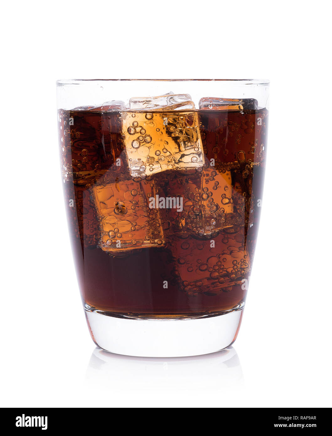 Cola in glass with ice cubes on white background Stock Photo - Alamy