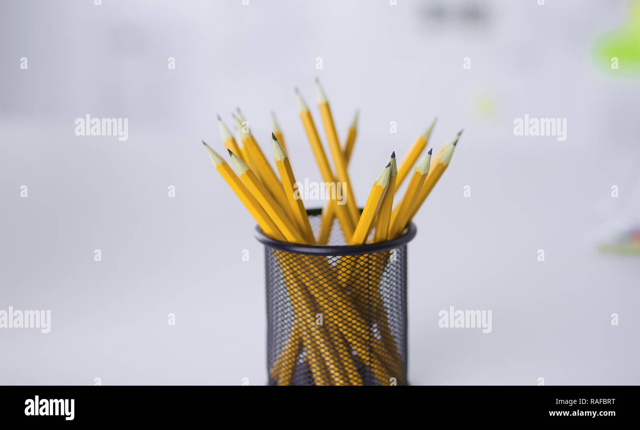 Graphite pencils in a metal gridcontainer. Concept Stock Photo Alamy