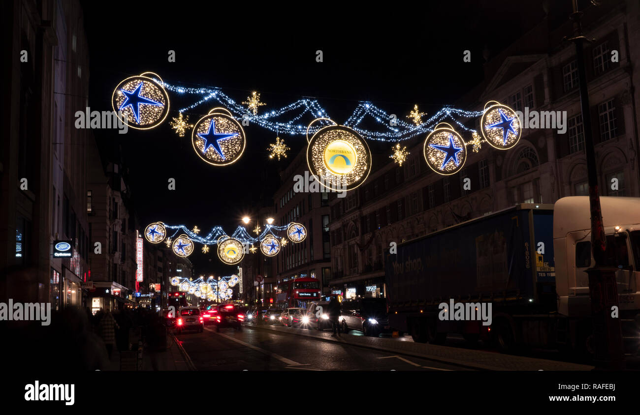 Christmas street decorations, The Strand, Central London, England, UK. Stock Photo